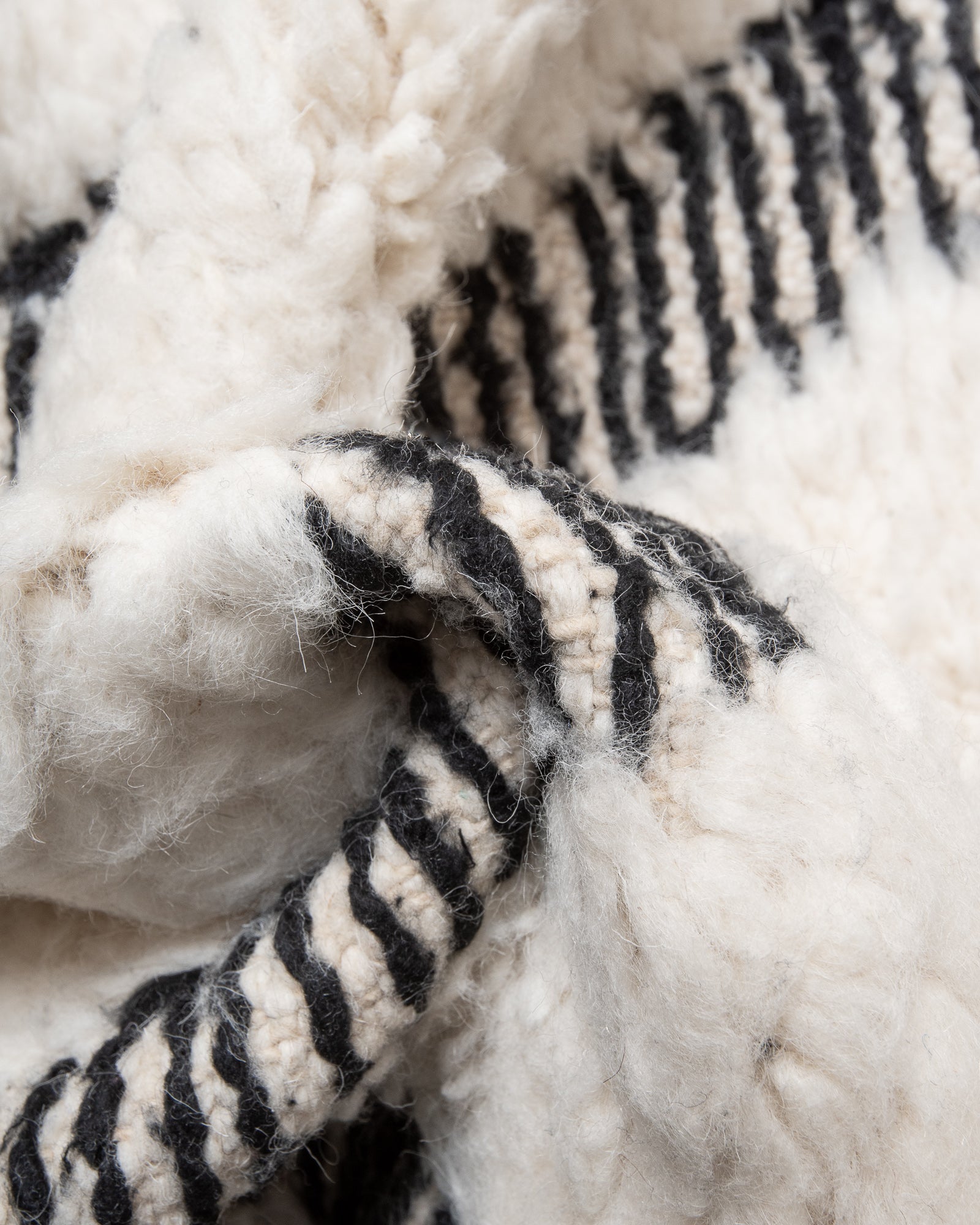 Modern, designer, handcrafted Berber rug from Morocco. Beniourain carpet with beautiful colours and patterns and fluffy wool texture.